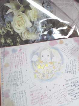 色紙と花束の写真